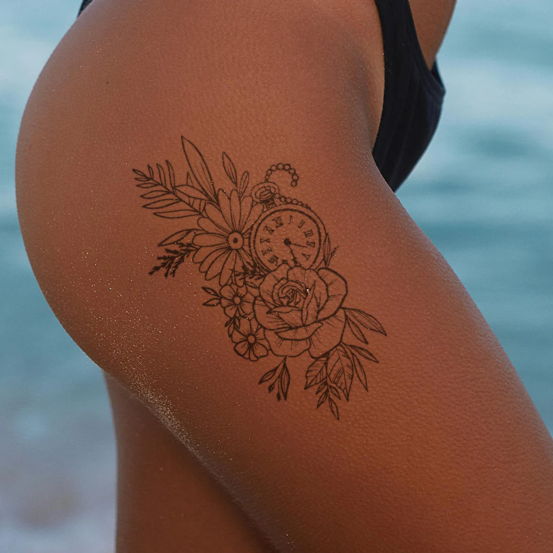 Fleurs et montre de poche