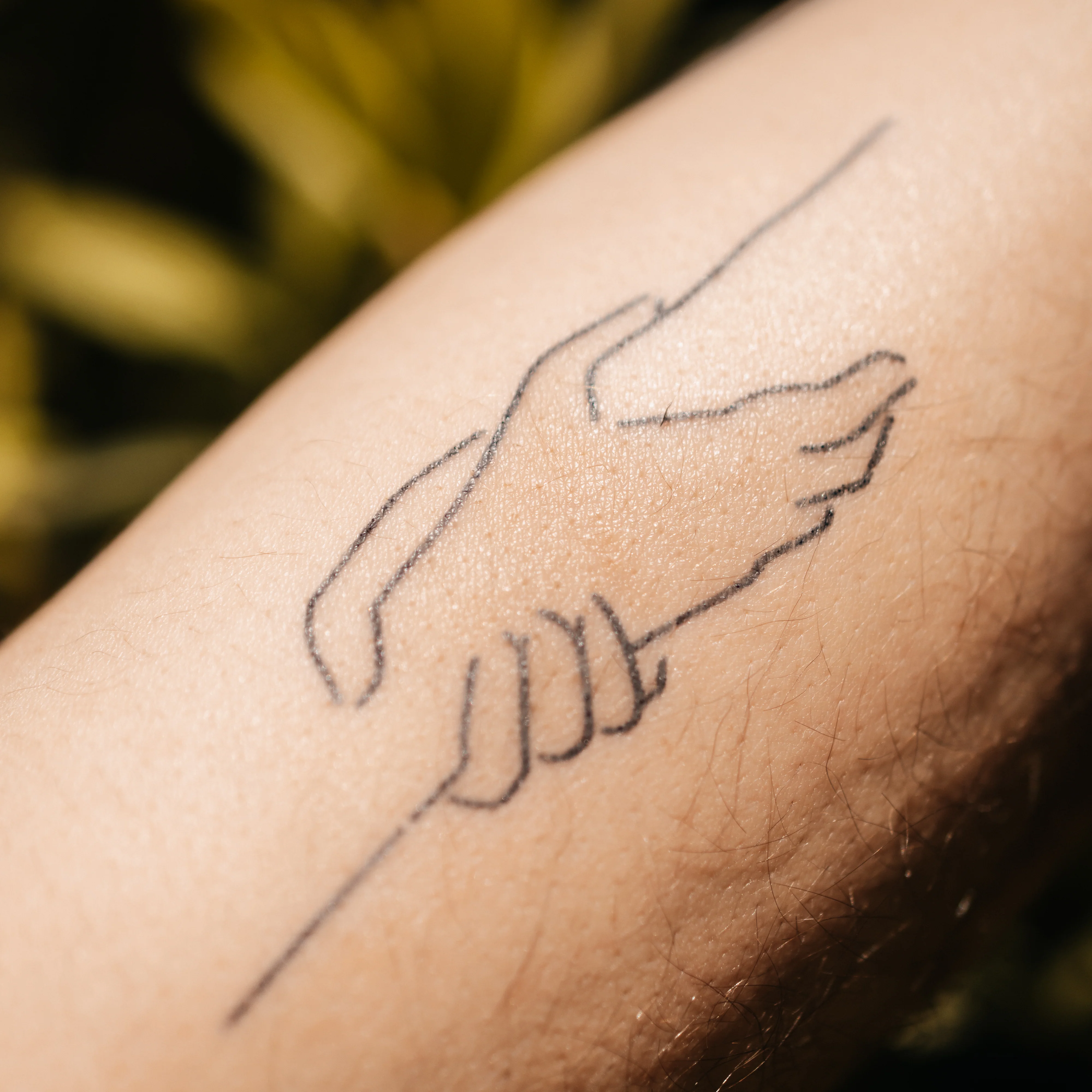 Tatouage Mains qui se tiennent