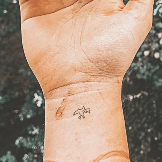Petit tatouage de ptérosaure