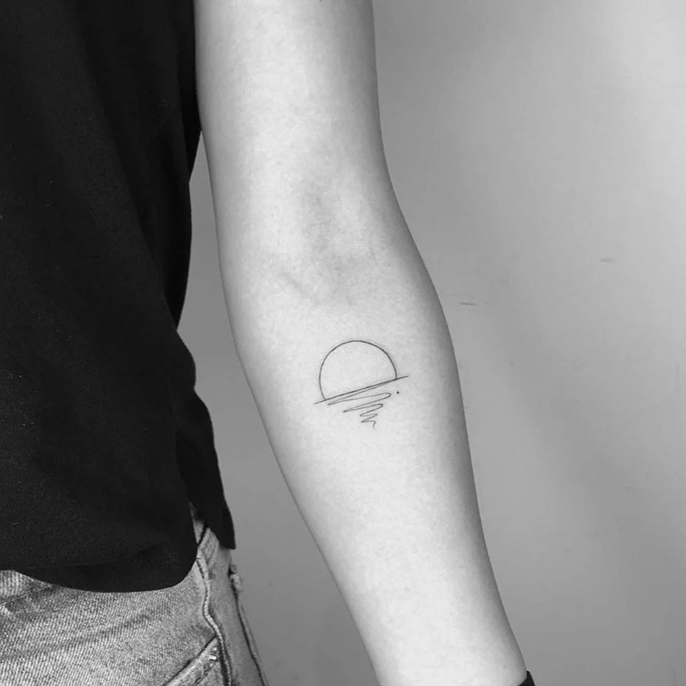Tatouage au coucher du soleil