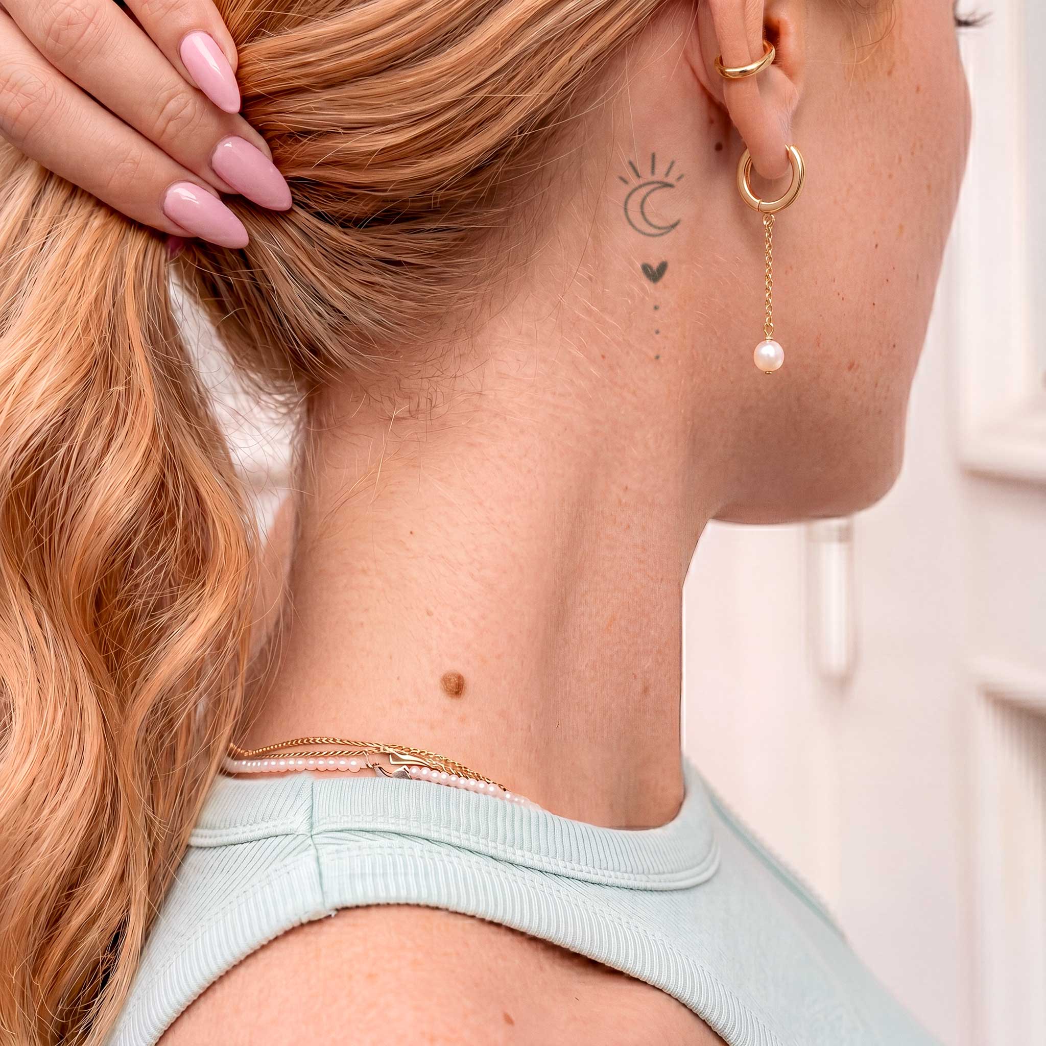 Tatouage ornement lune et cœur