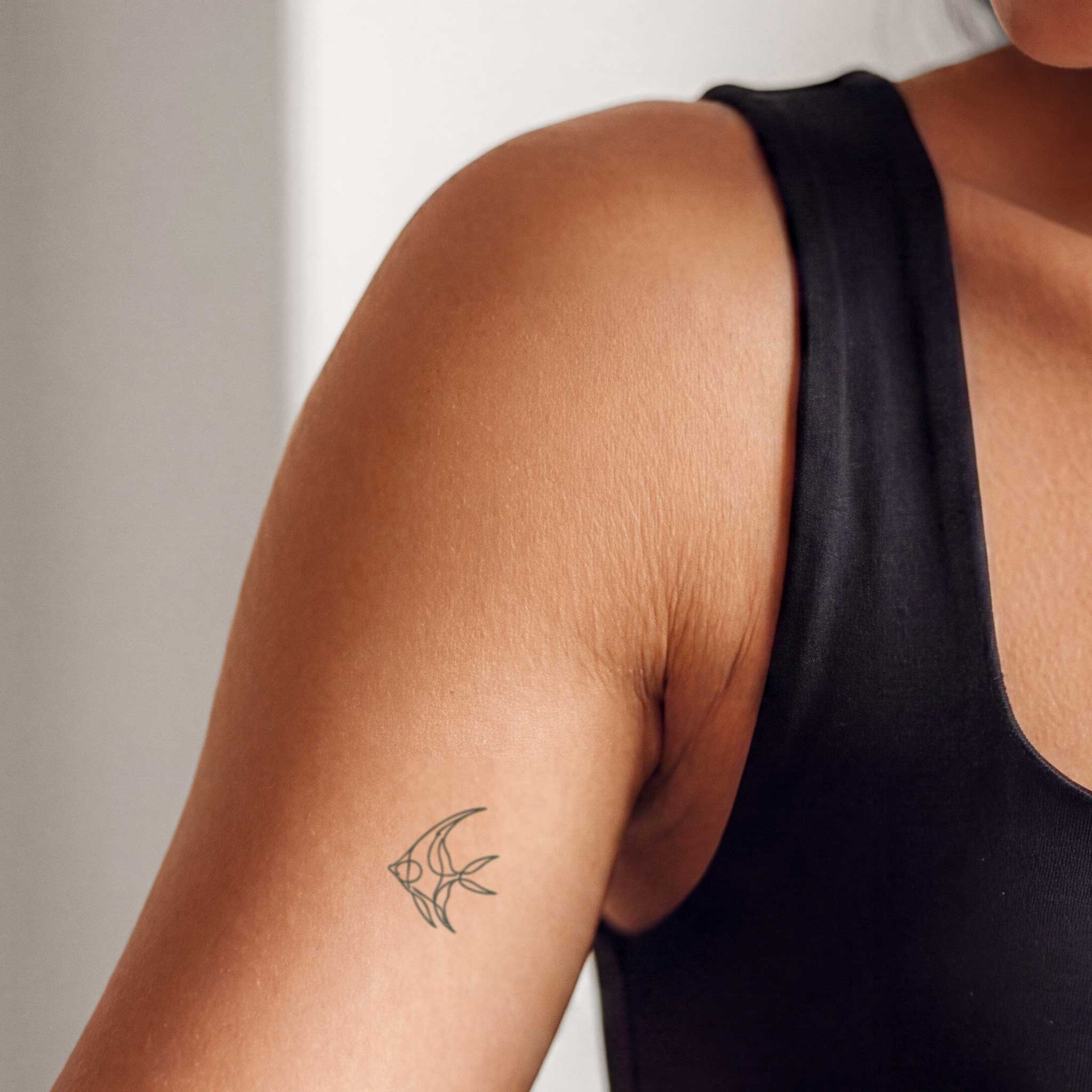 Tatouage poisson en une ligne