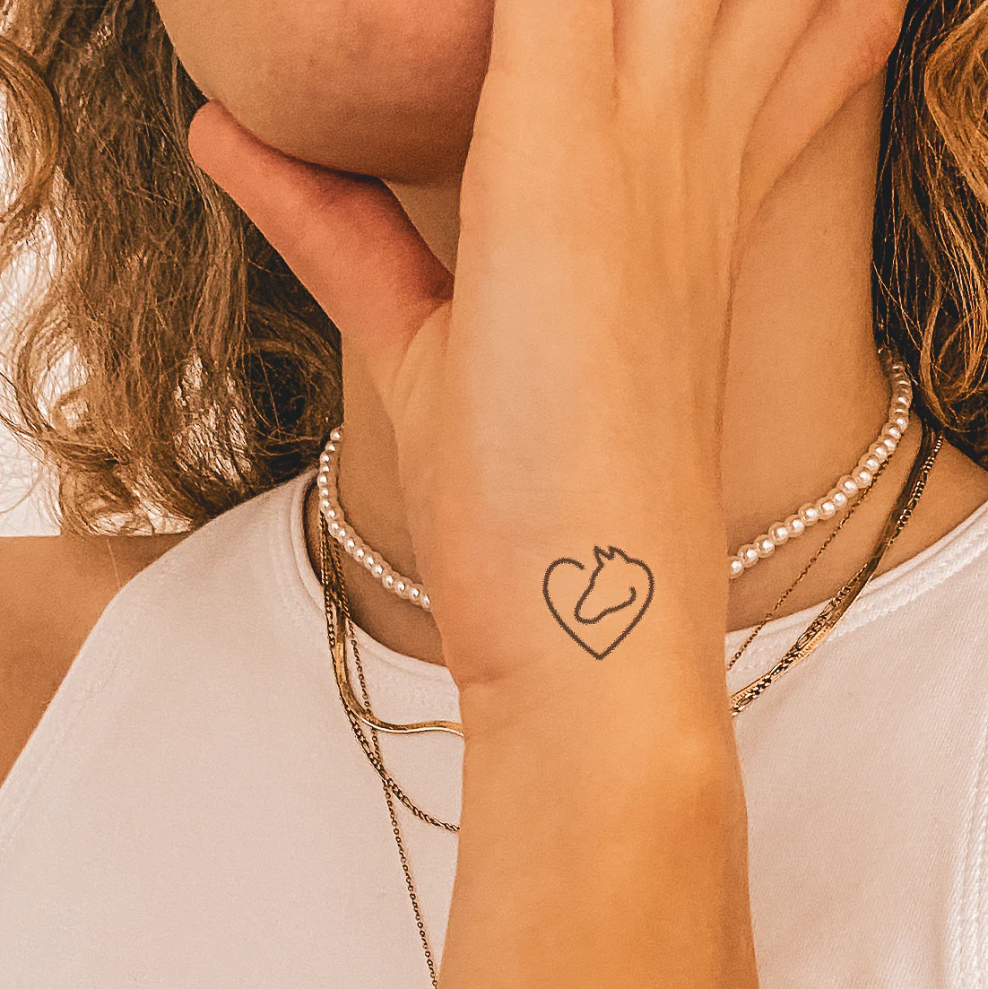 Tatouage cheval et coeur