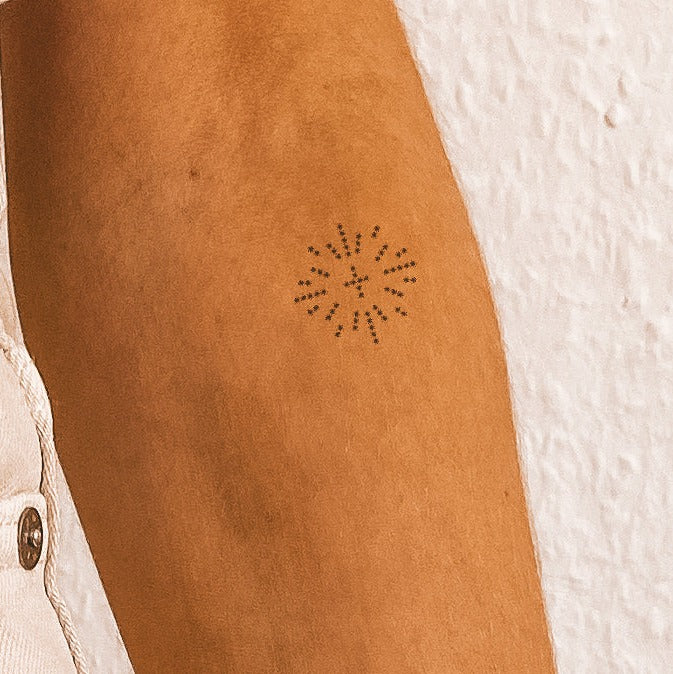 Tatouage de mandala à pois