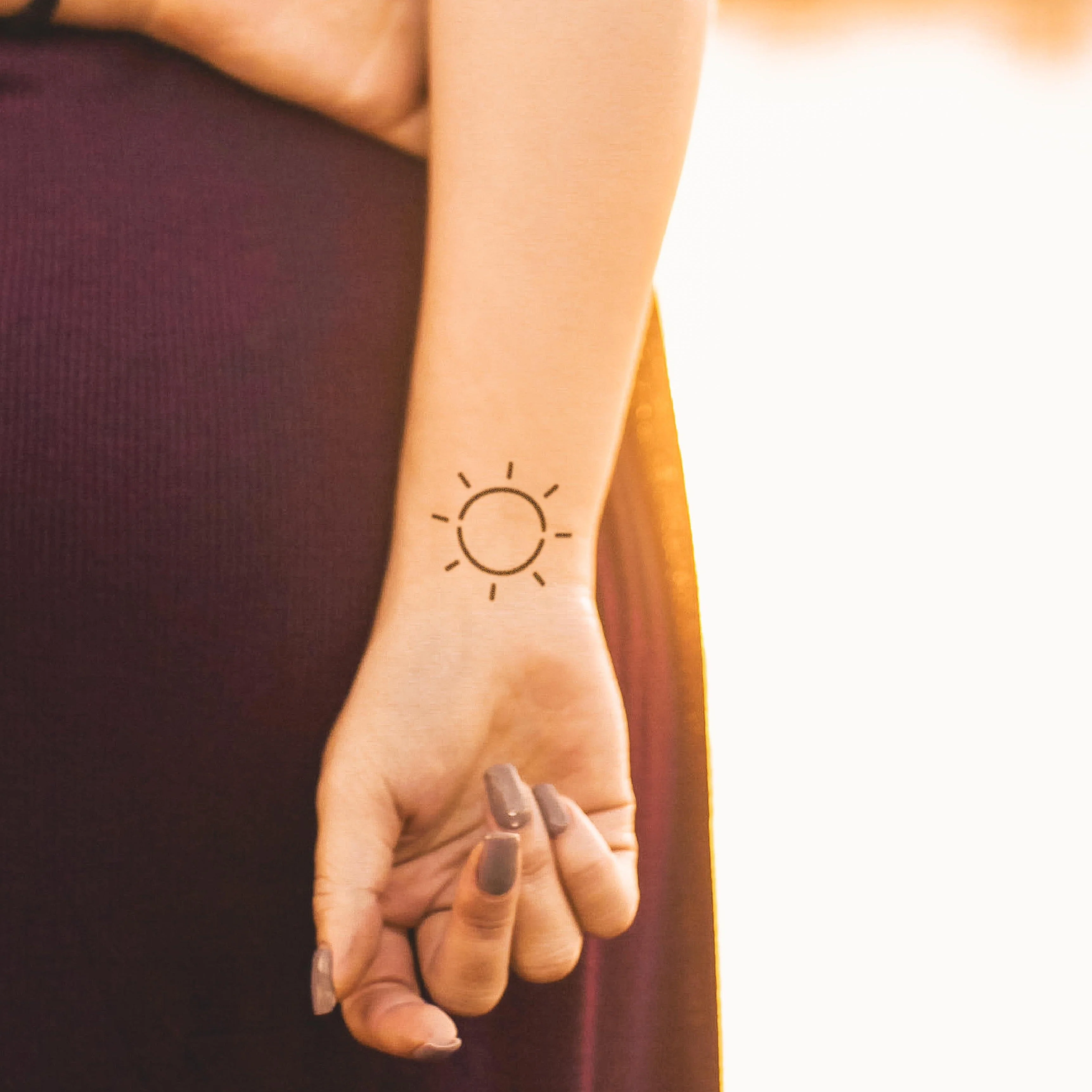 Tatouage soleil simple
