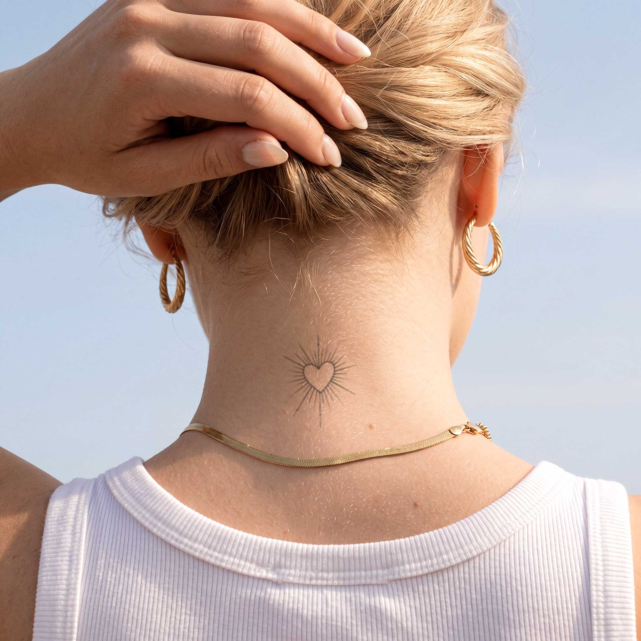 Tatouage cœur rayonnant