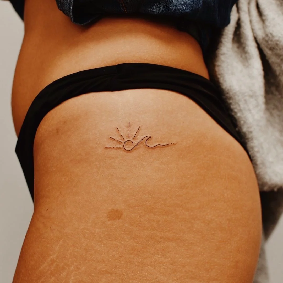 Tatouage Soleil avec Vague