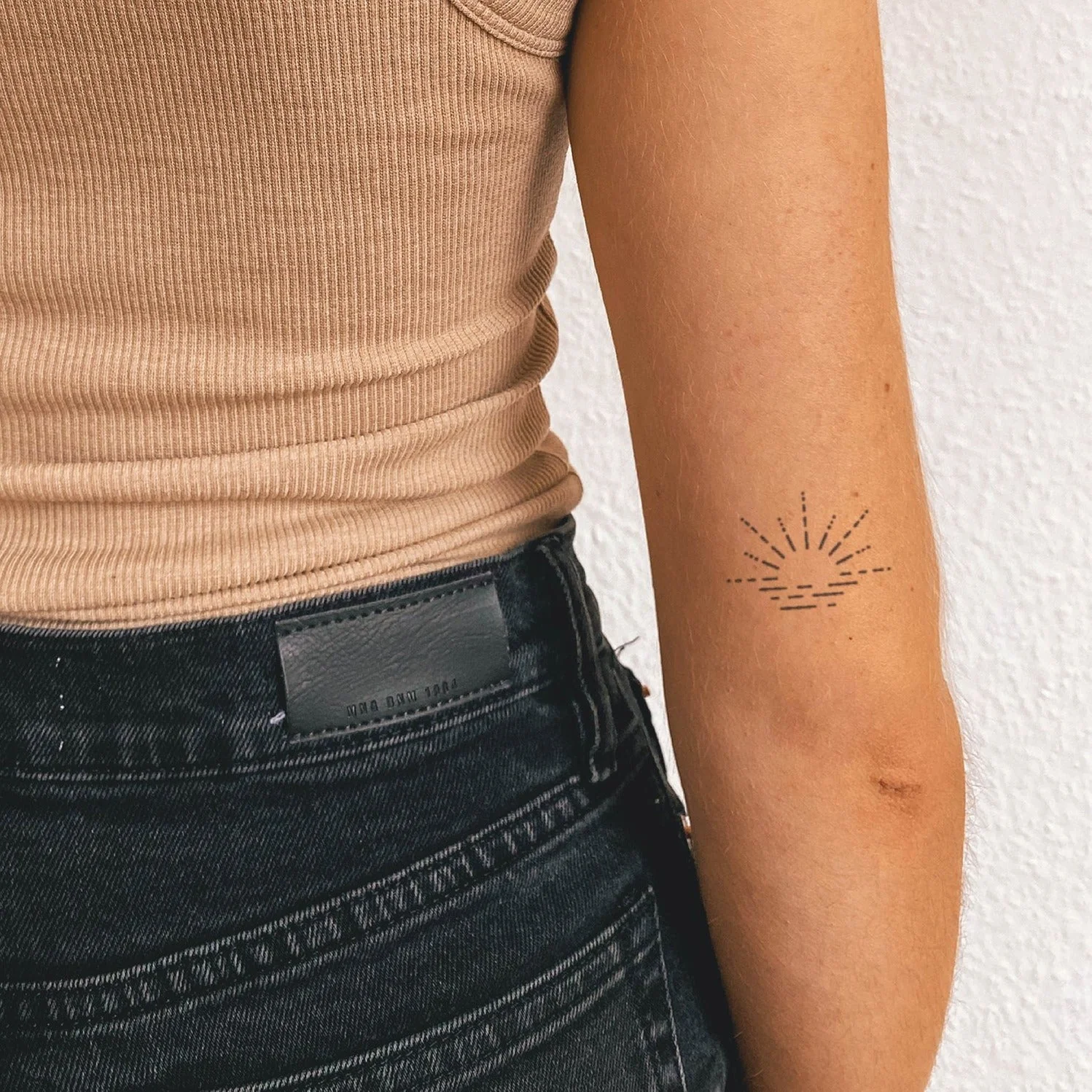 Tatouage de la mer au coucher du soleil