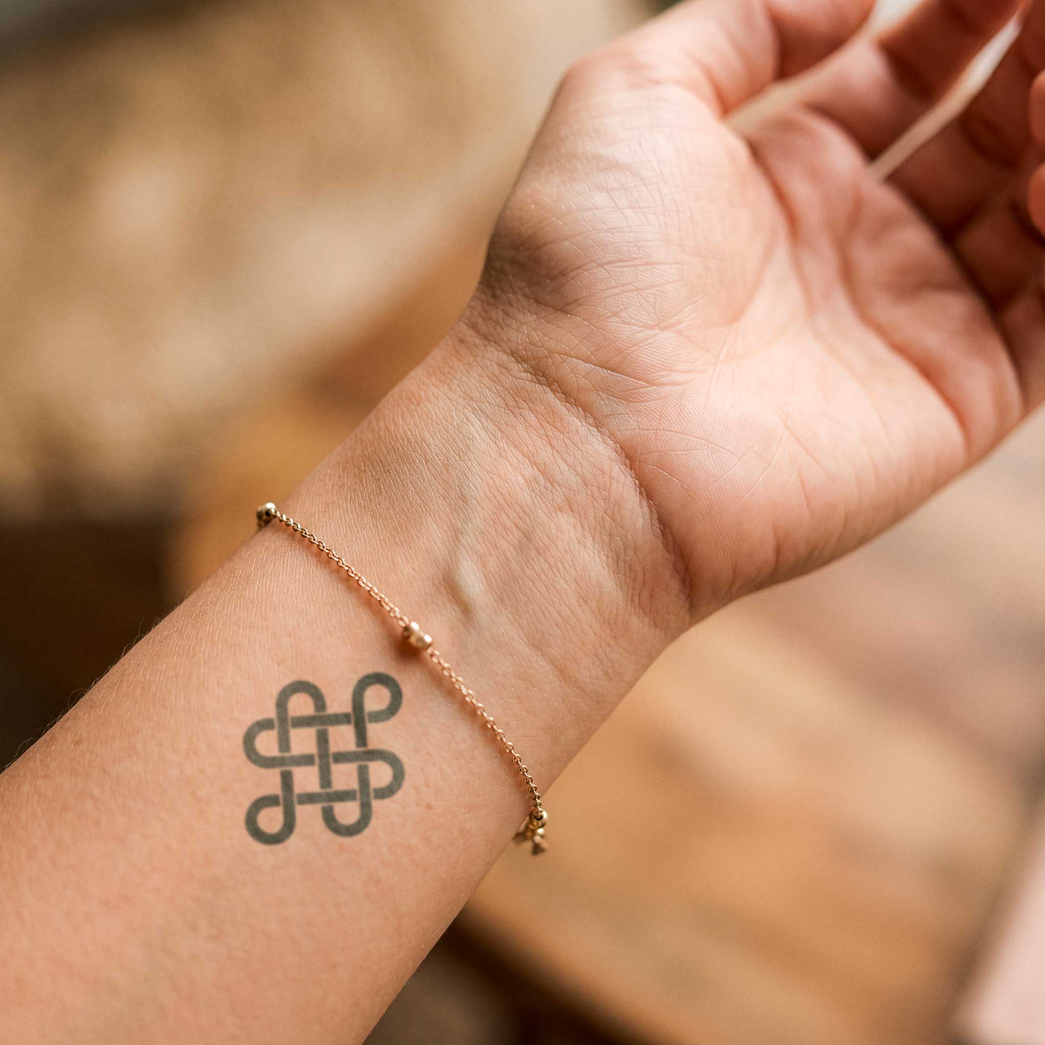 Tatouage symbole du karma